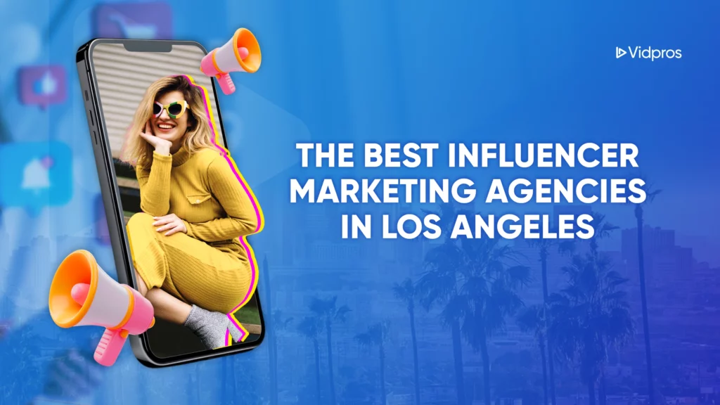 A woman in a yellow dress and sunglasses smiles, sitting with one leg crossed over the other inside a phone screen. The blue background features palm trees. Text reads, THE TOP INFLUENCER MARKETING AGENCIES IN LOS ANGELES.