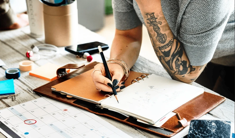 alt="lady video content creator planning her next content strategy"